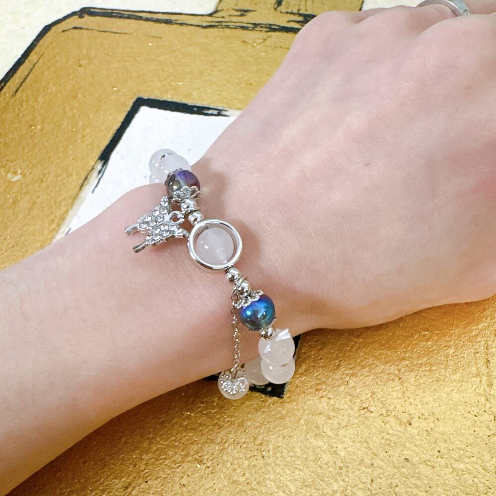 White Beaded Bracelet with Silver Butterfly Charm & Blue Accent Beads